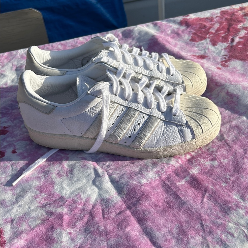 Adidas superstar with silver trim size 8